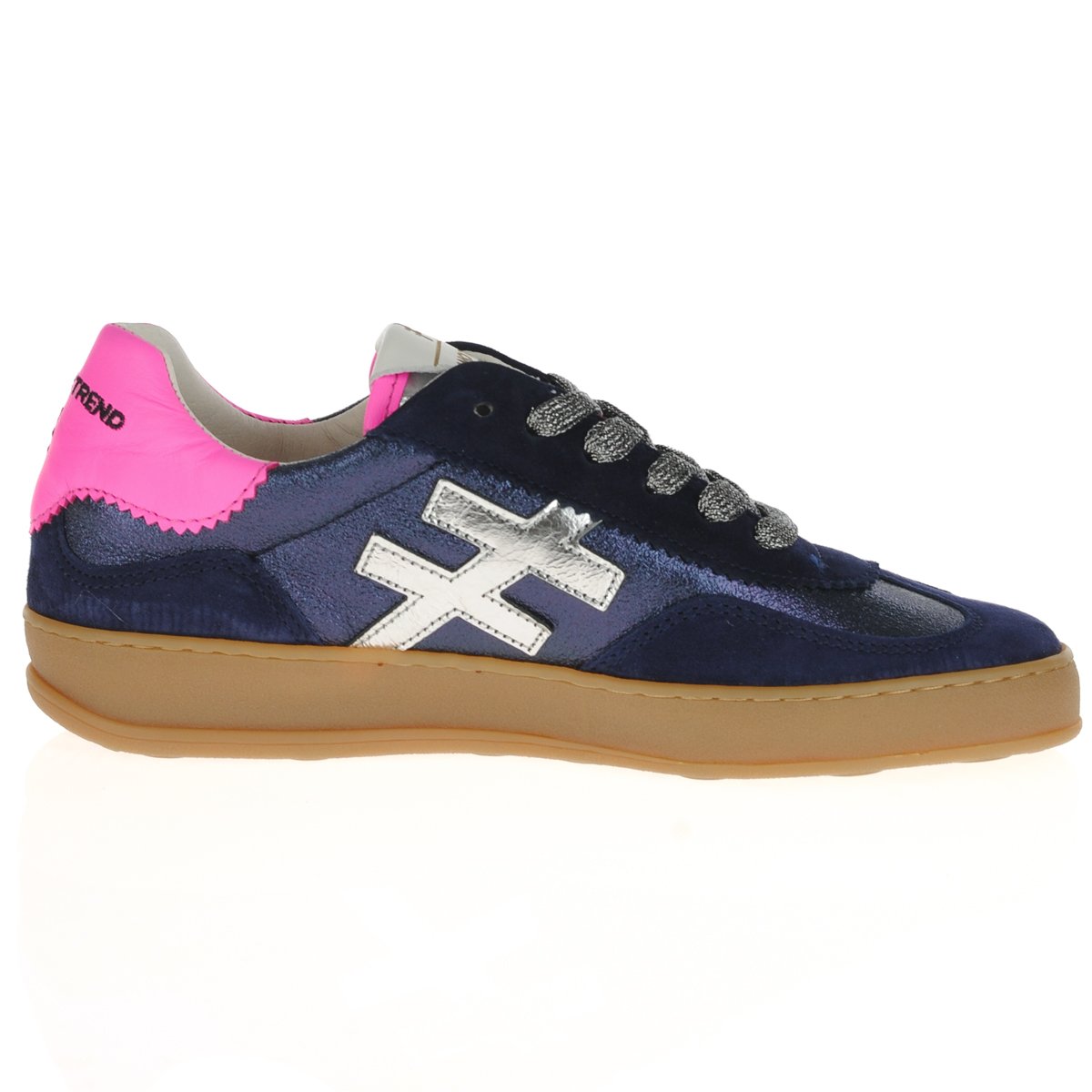 A low-top sneaker in navy blue suede and mesh with a metallic silver X logo, a bright pink heel tab, and a gum brown sole, shown from the side on a white background by Weirs Gifts
