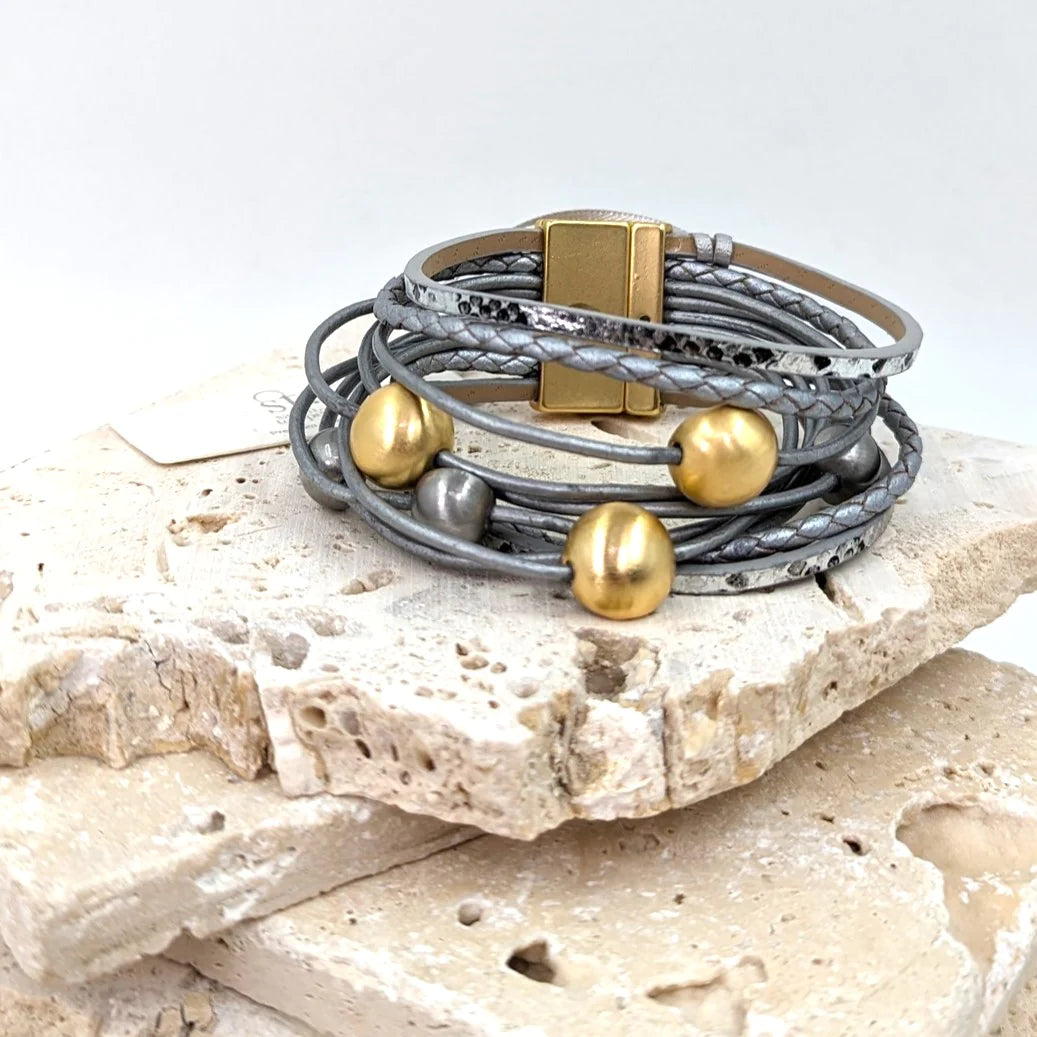 Brushed Dome Shape Components on Multi Strand Leather Bracelet by Weirs of Baggot Street