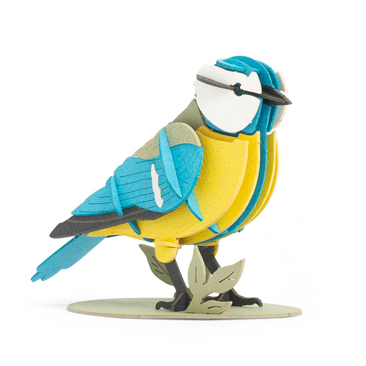 Assembled Kikkerland Blue Tit 3D Puzzle in blue and yellow on its stand