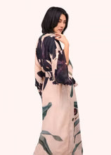 Woman wearing a floral kimono-style garment on a white background by Weirs Gifts