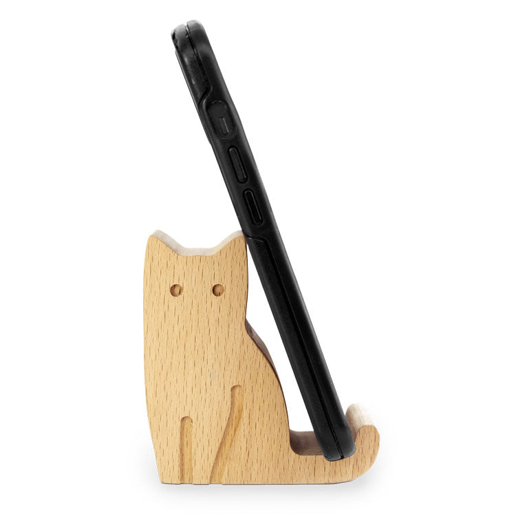 Kikkerland cat-shaped wooden phone stand holding a smartphone