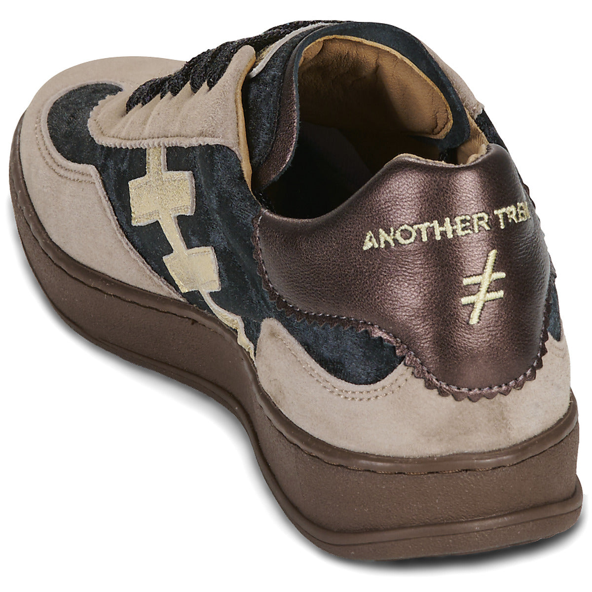 A close-up rear three-quarter view of a sneaker by Another Trend, featuring a brown leather heel counter, beige suede overlays and a thick brown platform sole at Weirs Gifts