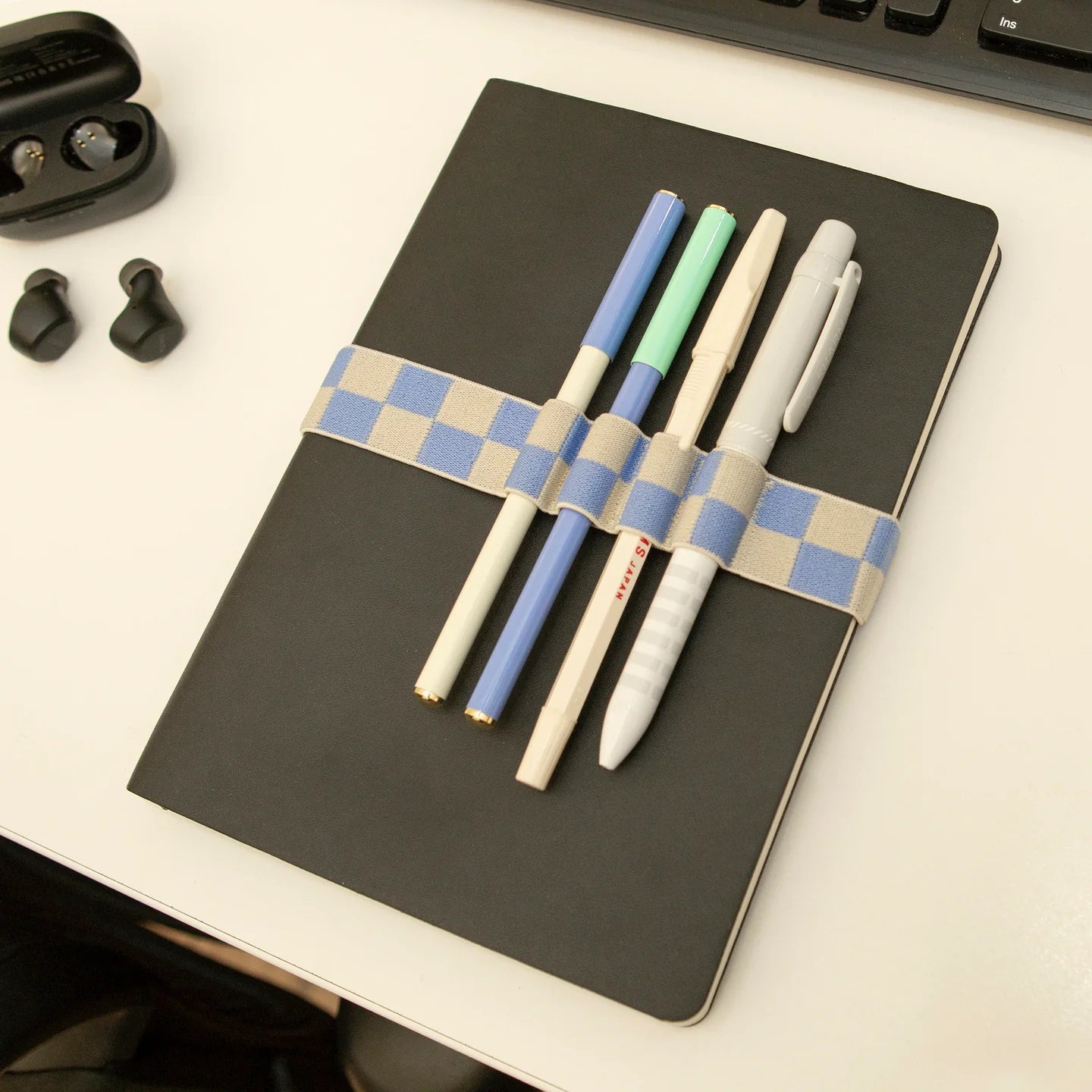 Fab Gifts | Kikkerland Blue Pen Holder Book Band by Weirs of Baggot Street