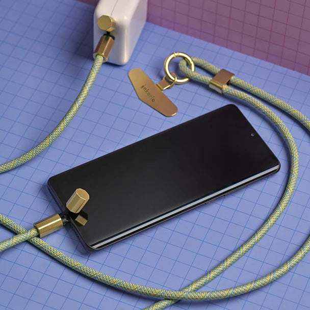 Kikkerland Charge and Carry phone lanyard in its retail packaging
