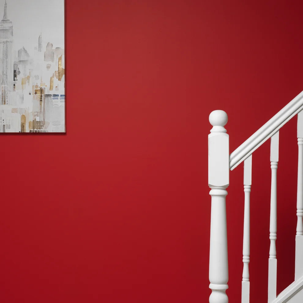 Frenchic Hot Lips scarlet-red wall beside a white staircase