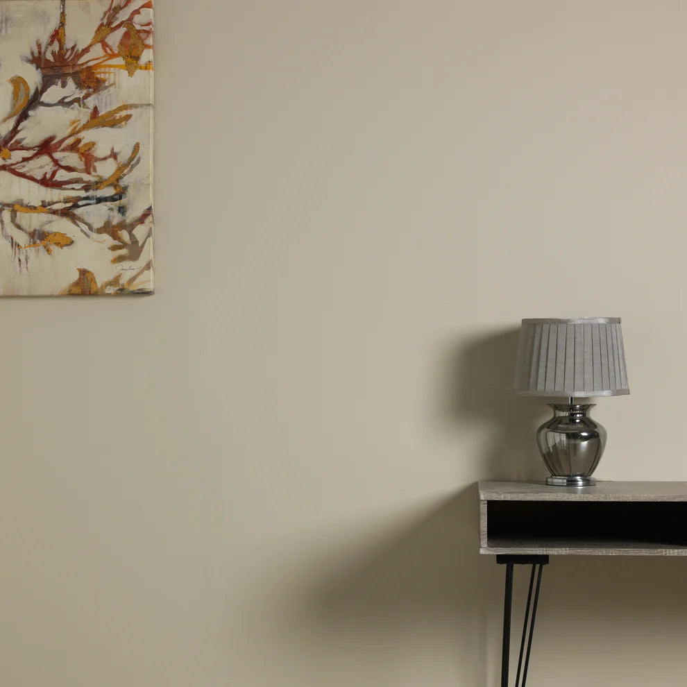 Frenchic Sugar Puff wall beside a console table, lamp and artwork