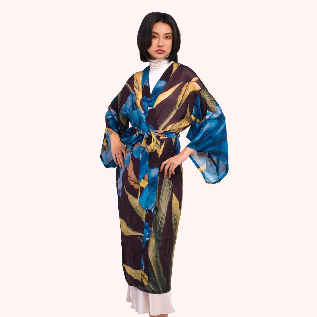 Woman wearing a colorful kimono-style dress on a white background by Weirs Gifts